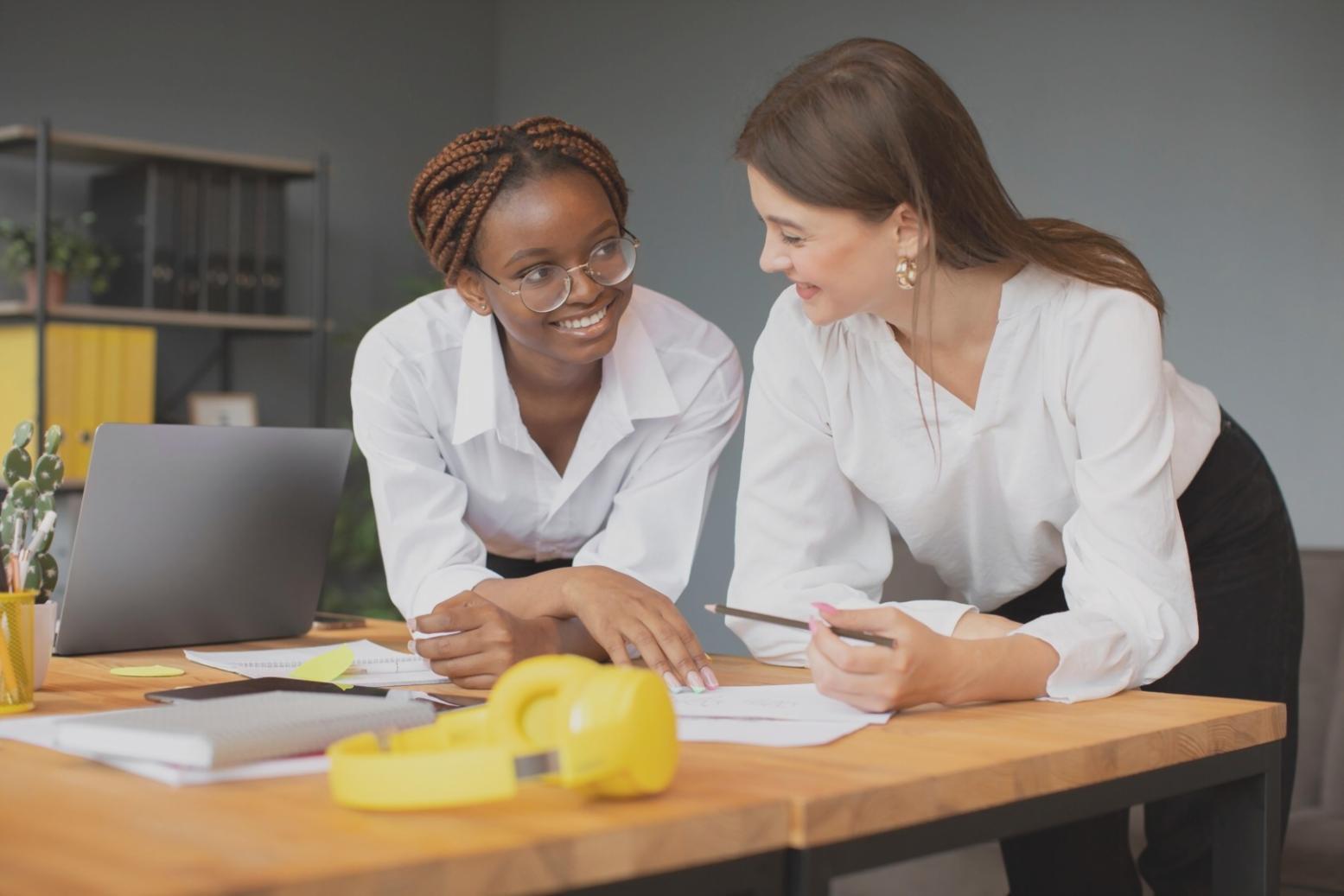 Financial documents and planning materials spread on desk